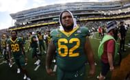 Siaki Ika #62 of the Baylor Bears walks off the field following Baylors 42-7 win over Texas State
